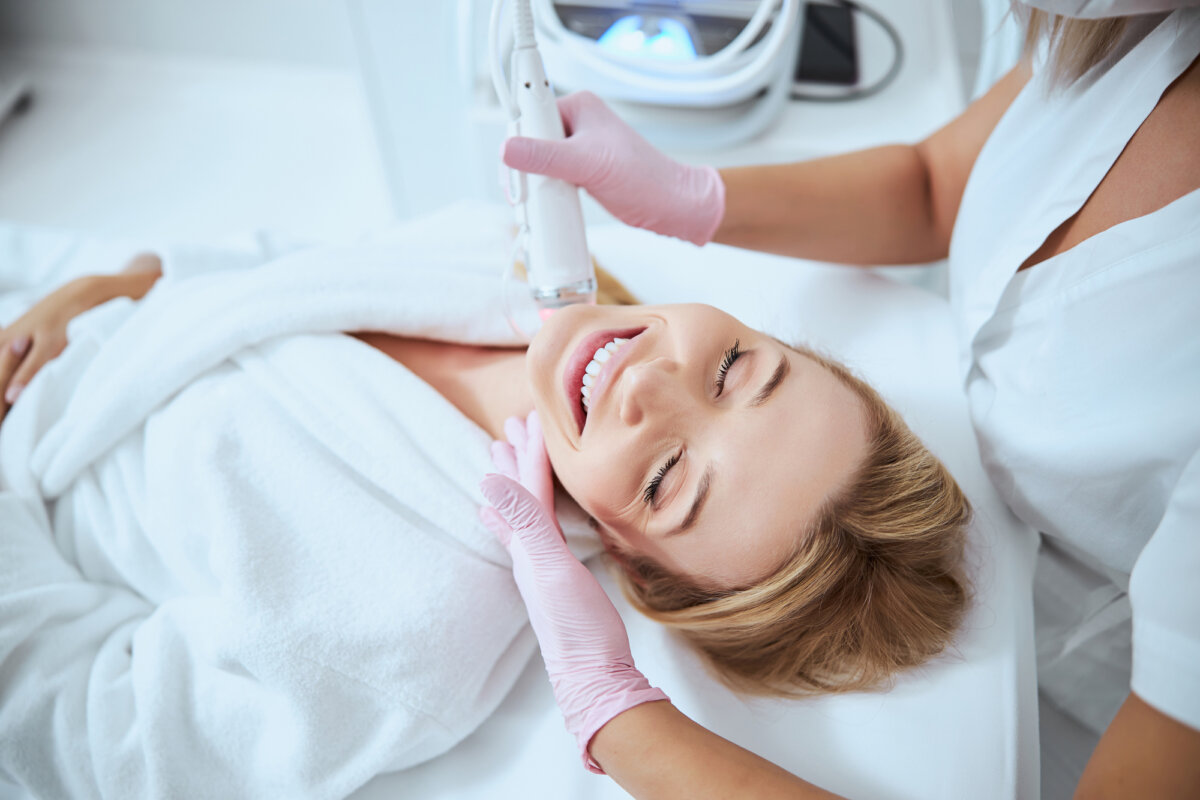 North Texas Microneedling Services by The Drip Mobile IV - Young female client enjoying the microneedling procedure